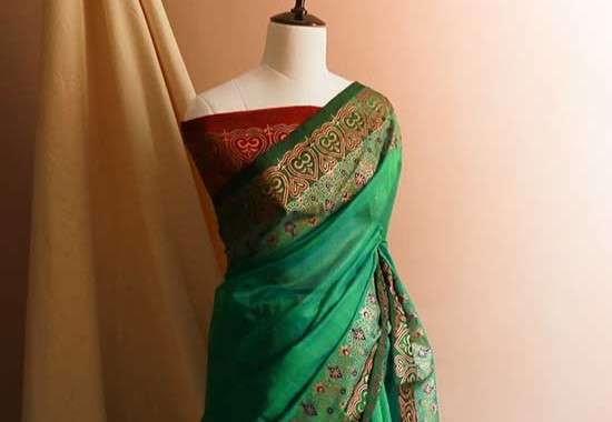 An Emerald Green Block Printed Saree from Uddup Silk, Chennai
