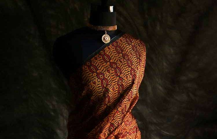 An Apricot Organza Silk Saree that is to be cared and cherished from Uddup Silk, Chennai