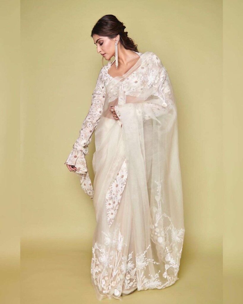 Get inspiration of Organza Saree Blouse ideas with Sonam Kapoor in White Organza Saree