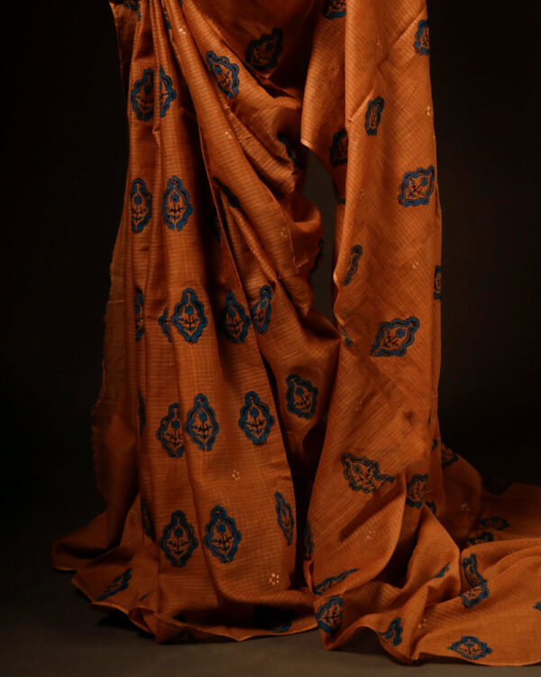 Floral Motifs Spiced Orange Kota Cotton Saree, bottom side close up